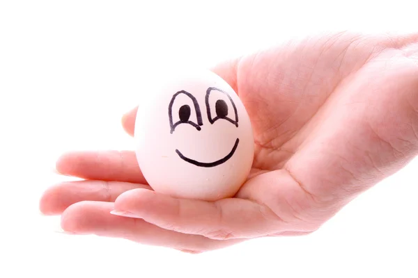 Αυγό στο χέρι απομονωθεί σε λευκό — Φωτογραφία Αρχείου