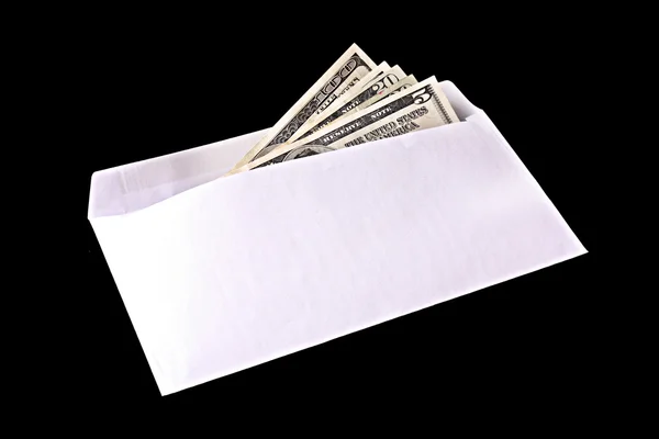 Dollar banknotes in envelope on black background — Stock Photo, Image