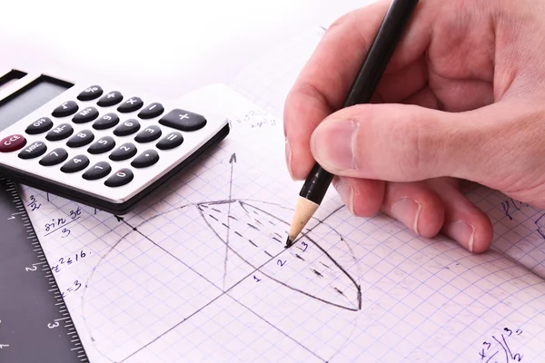 Someone doing geometry exercise in notepad — Stock Photo, Image