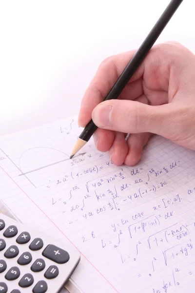 Ktoś robi geometria ćwiczenia w notatniku — Zdjęcie stockowe