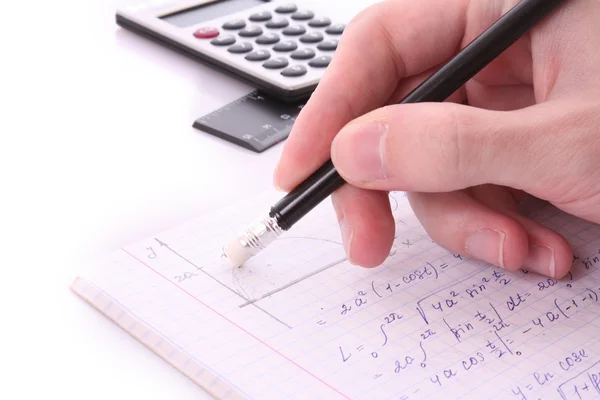 Someone doing geometry exercise in notepad — Stock Photo, Image