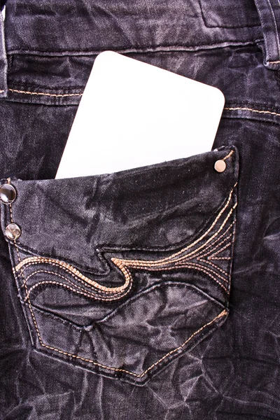 Białe etykiety w kieszeni jeansów — Zdjęcie stockowe