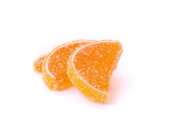 Poucos geléia de frutas de limão fatiado isolado em branco — Fotografia de Stock