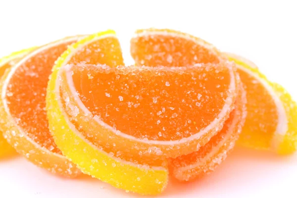 Poche fette di gelatina di limone isolato su bianco — Foto Stock