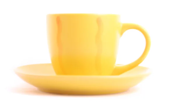 Copo amarelo isolado em branco — Fotografia de Stock
