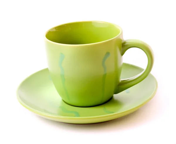 Grüne Tasse isoliert auf weiß — Stockfoto
