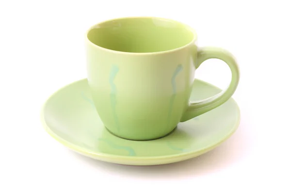 Зеленая чашка изолирована на белом — стоковое фото