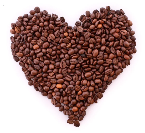 Grains de café dans le symbole du cœur isolé sur blanc. J'adore le café. . — Photo