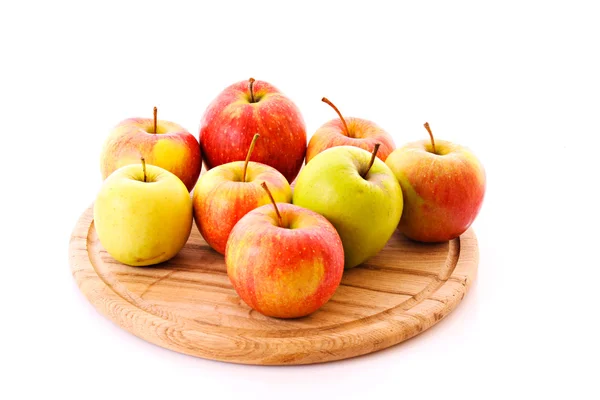 Few apples on wooden tray isolated on white — Stock Photo, Image