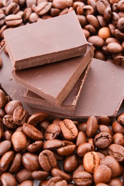 Čokolády a kávy lusky — Stock fotografie