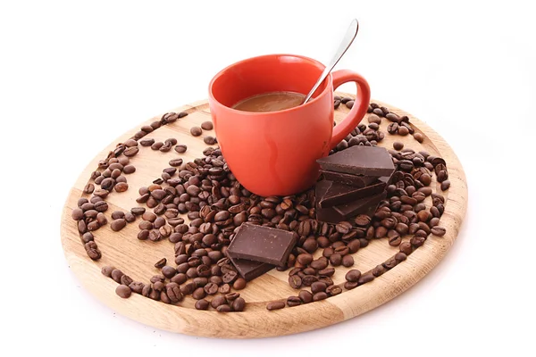 Schokolade, Kaffeebohnen und Tasse mit Kaffee — Stockfoto