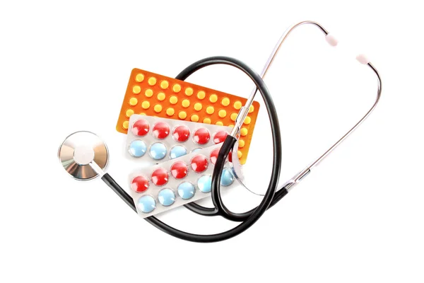 Tabletki i stetoskop — Zdjęcie stockowe