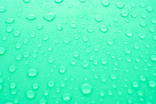 Vatten droppar bakgrund med stora och små droppar — Stockfoto