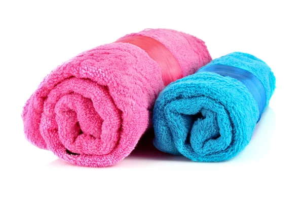 Twisted blue and pink towels with bands isolated on white — Stock Photo, Image
