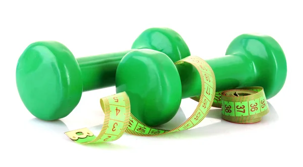 Dumbbells and measuring tape isolated on white — Stock Photo, Image