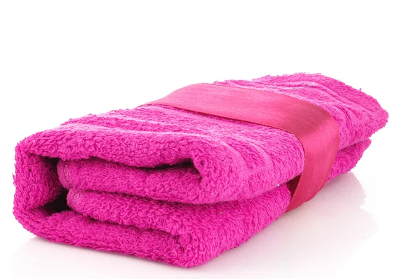 Toalha rosa dobrada com a faixa isolada em branco — Fotografia de Stock
