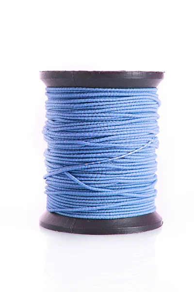 Blue bobbin of thread isolated on white — Stock Photo, Image