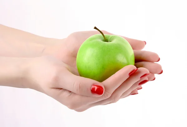 Une pomme sur la main isolée sur blanc — Photo