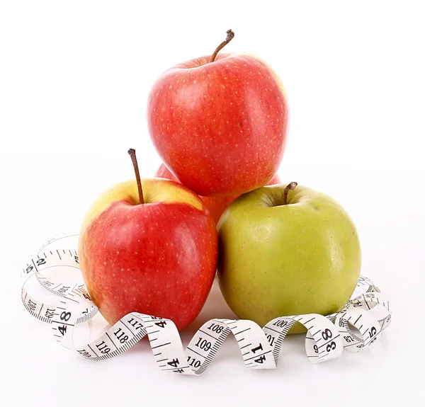 Manzanas y cinta métrica, concepto de dieta —  Fotos de Stock