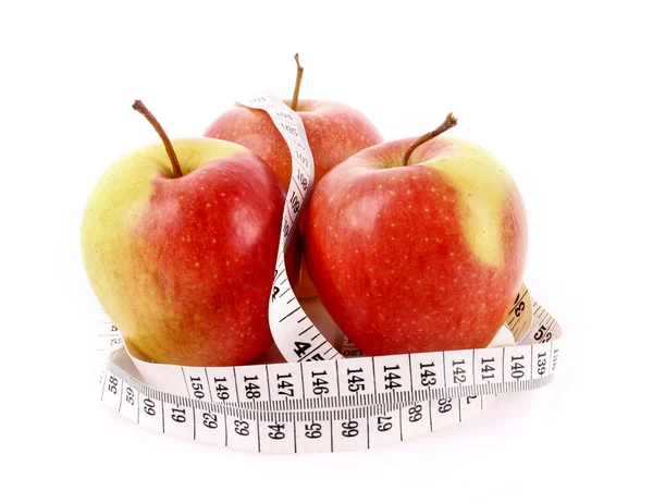 Manzanas y cinta métrica, concepto de dieta —  Fotos de Stock