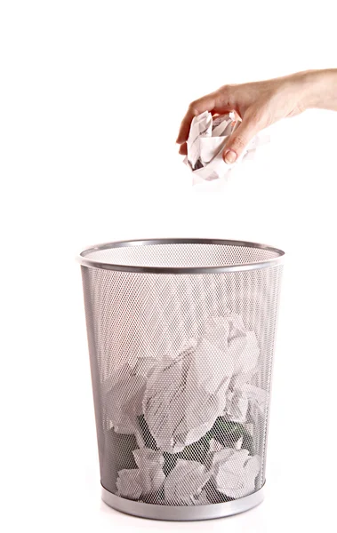 Birisi çöp çöp üzerinde beyaz izole koymak — Stok fotoğraf