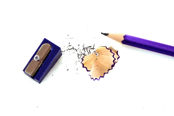 Pencil and wood shavings on white — Stock Photo, Image