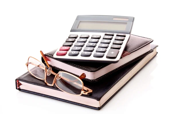 A notebookok és elszigetelt fehér óra szemüveg — Stock Fotó