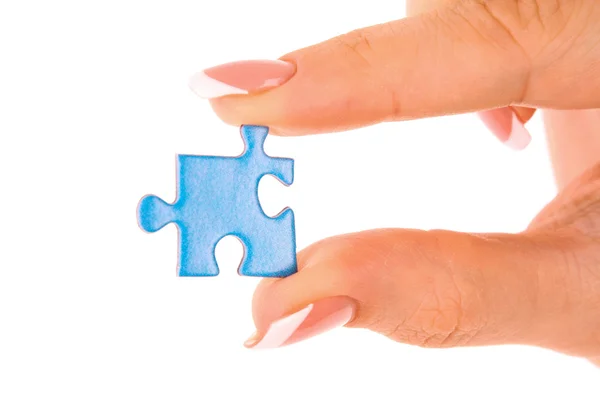 Hand mit Puzzle isoliert auf weiß — Stockfoto