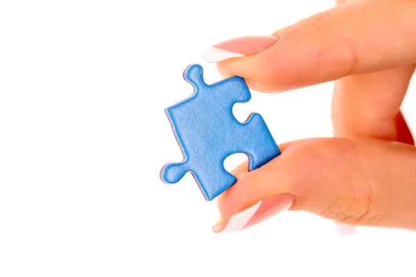 Hand with puzzle isolated on white — Stock Photo, Image