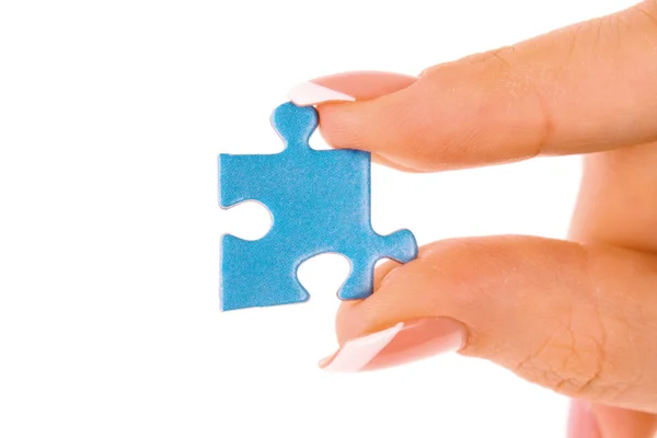 Hand mit Puzzle isoliert auf weiß — Stockfoto