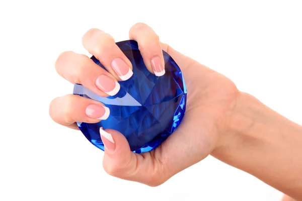 Diamante azul gigante na mão isolado em branco — Fotografia de Stock