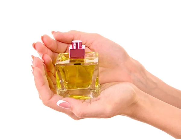 Fles parfum in de hand geïsoleerd op wit — Stockfoto