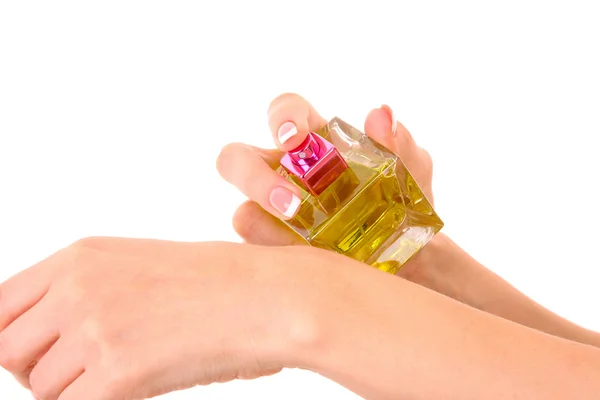 Garrafa de perfume na mão isolado em branco — Fotografia de Stock