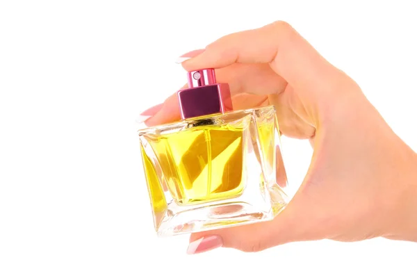Flacon de parfum dans la main isolé sur blanc — Photo