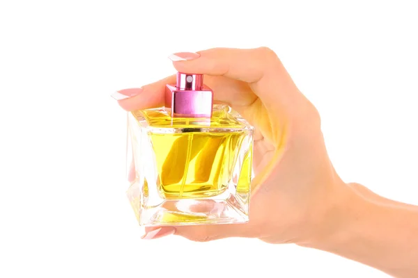 Butelka perfum w ręku na białym tle — Zdjęcie stockowe