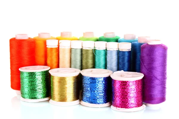 Semicircle of many-coloured bobbins of thread isolated on white — Stock Photo, Image