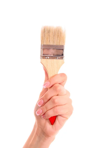 Brush in hand isolated on white — Stock Photo, Image