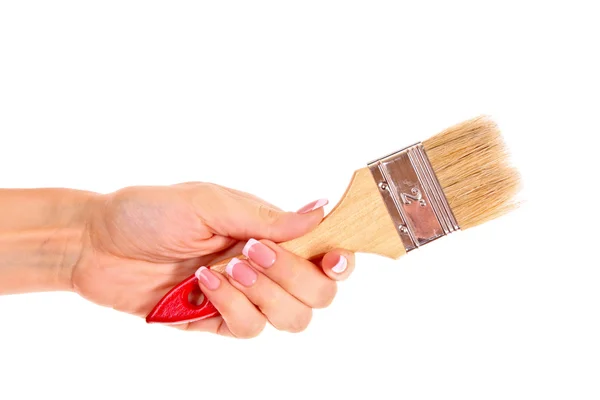 Mão com escova isolada em branco — Fotografia de Stock