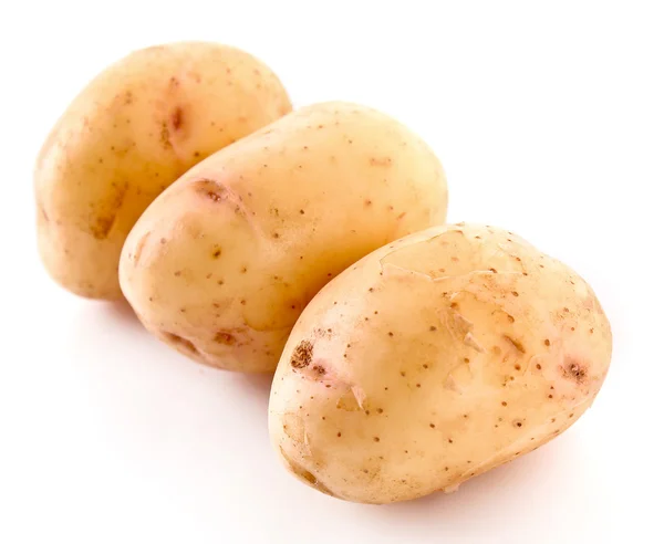 Три картошки, изолированные на белом — стоковое фото