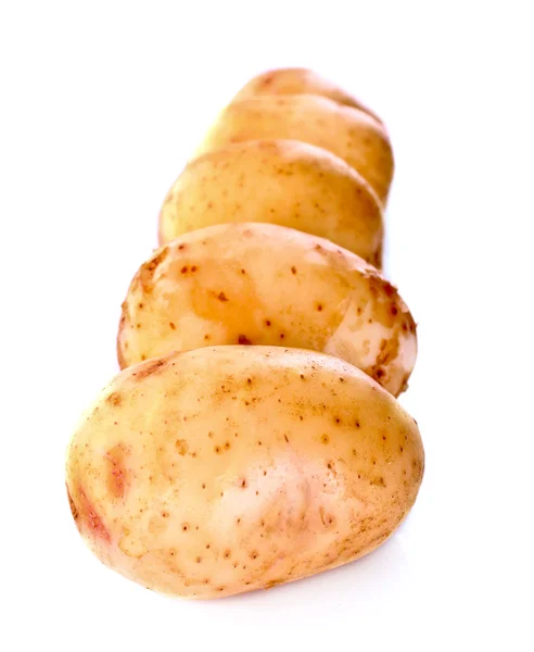 Few potatoes isolated on white — Stock Photo, Image