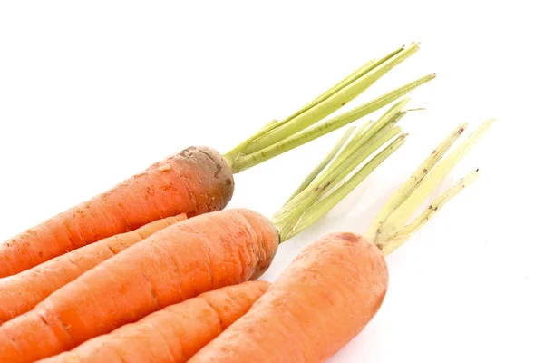 Pocas zanahorias aisladas en blanco —  Fotos de Stock