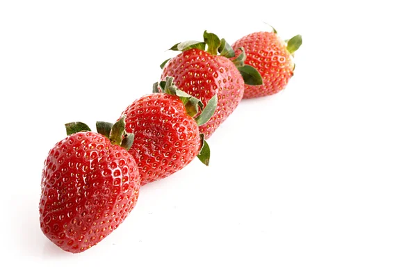 四个草莓上白色隔离 — 图库照片