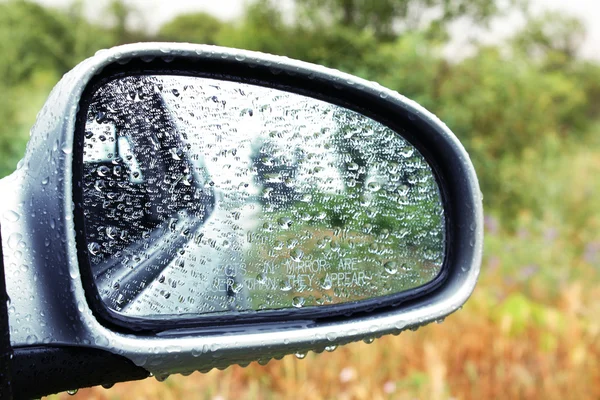 Automobile Rear mirror with water drops — Stock Photo, Image