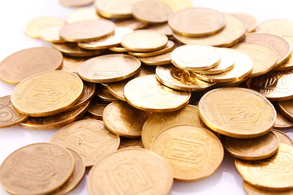 Un sacco di monete isolate su bianco — Foto Stock