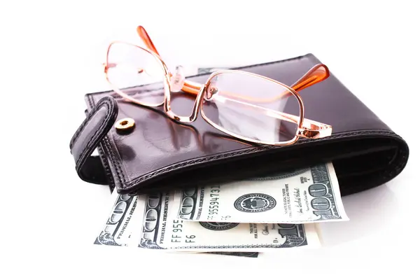 Gözlük, çanta ve Doları banknot üzerinde beyaz izole — Stok fotoğraf