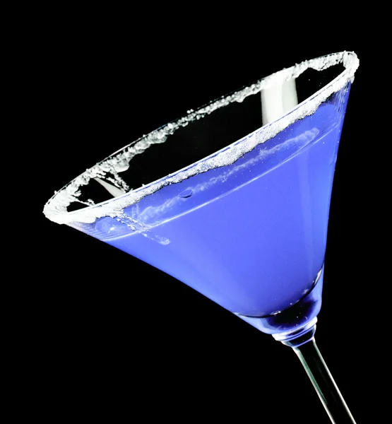 stock image Martini glass with blue coctail on black background