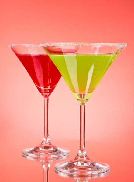 Martini glasses on red background — Stock Photo, Image