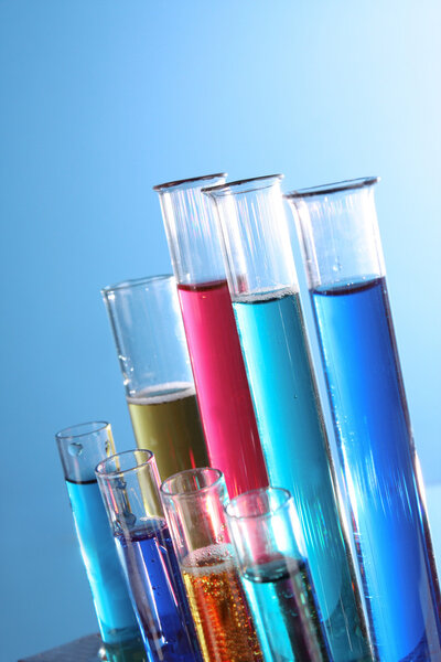 Test tubes on blue background