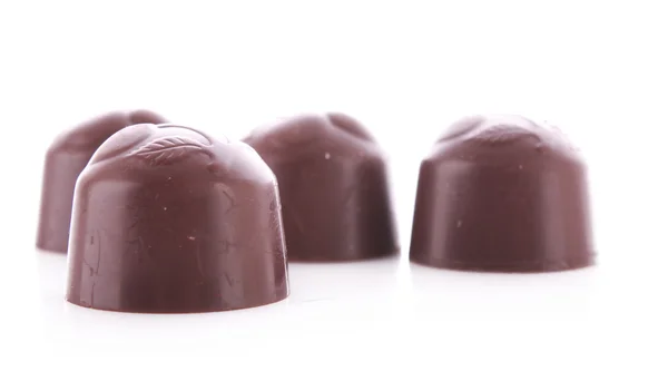 Chocolats isolés sur blanc — Photo