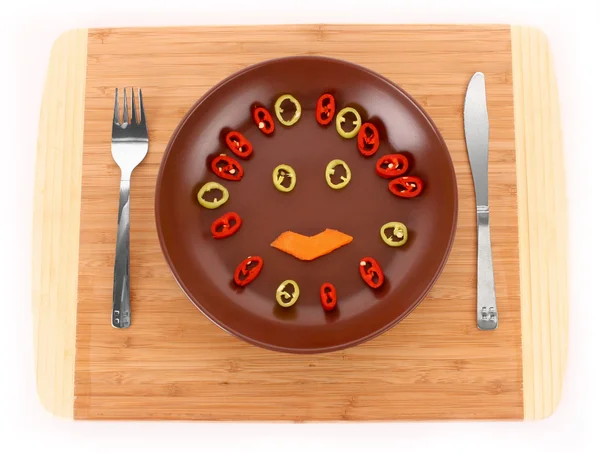Úsměv s jídlem na desce izolovaných na bílém — Stock fotografie